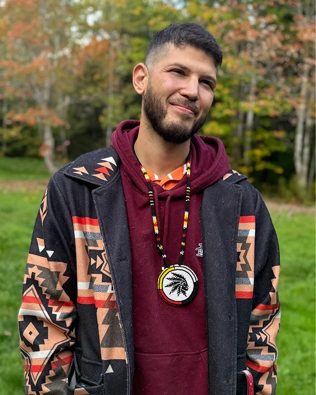 Clinton Ray Howard wearing a Glooscap's Finest medallion